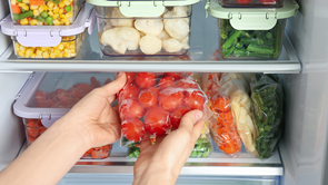 food prep storage containers of fresh produce in a fridge