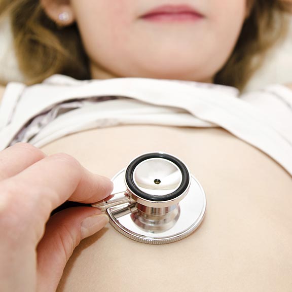 child being examined by a doctor square