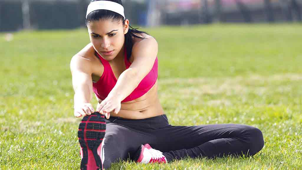 woman in gym gear warming up