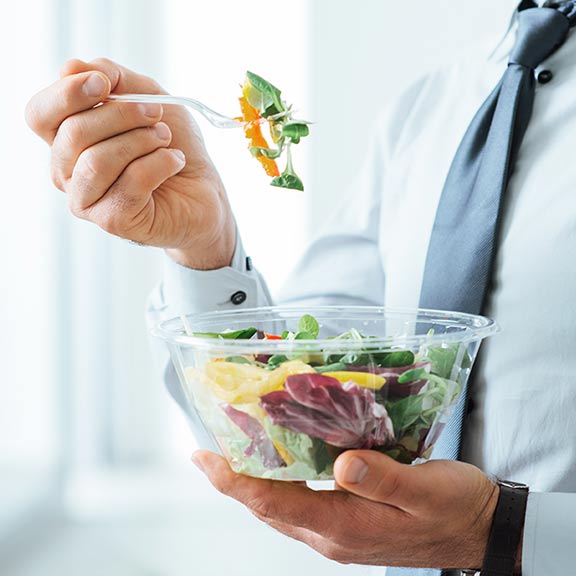 man eating salad sq