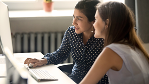 two people researching superannuation online