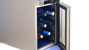 wine fridge open with bottles